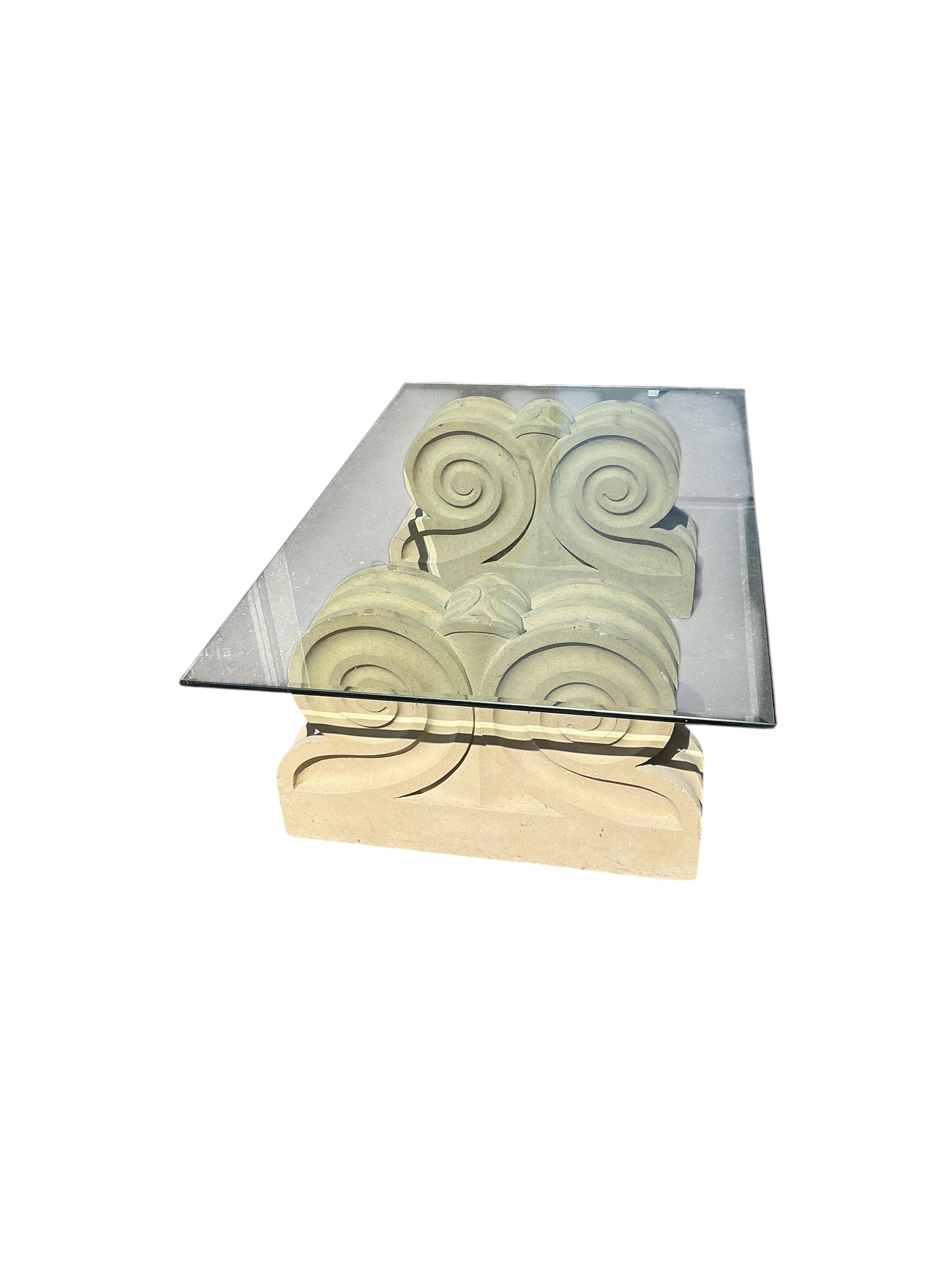 A reconstituted stone rectangular glass top garden table, width 117cm, depth 71cm, height 42cm